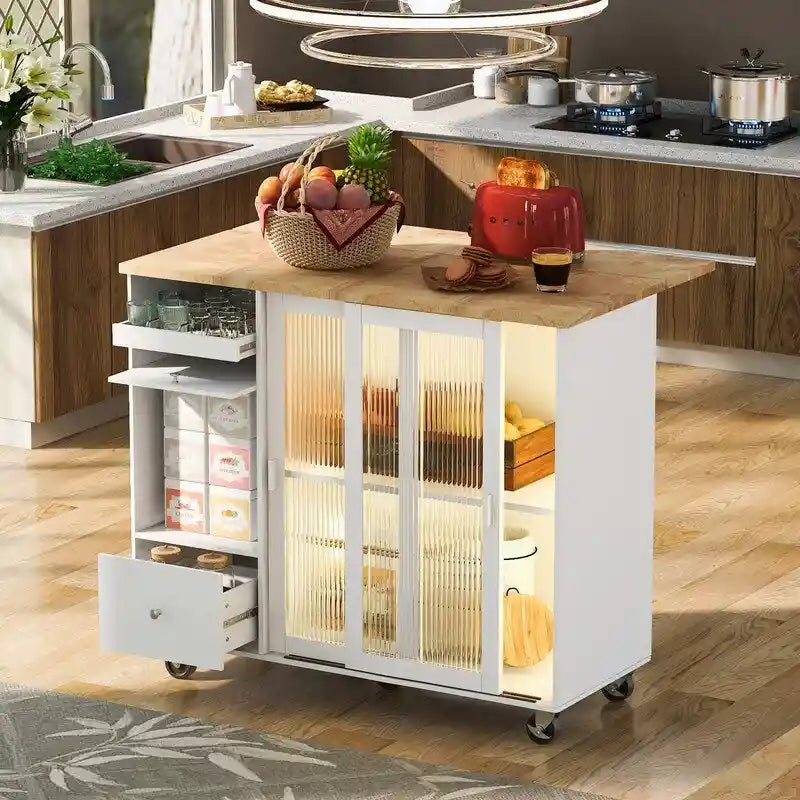 Desserte de cuisine à roulettes avec abattant, lumière LED, 2 portes vitrées cannelées et 1 porte d'armoire basculante.