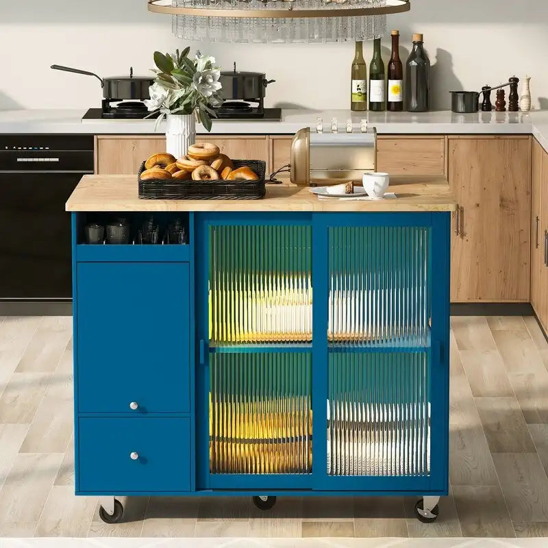 Desserte de cuisine à roulettes avec abattant, lumière LED, 2 portes vitrées cannelées et 1 porte d'armoire basculante.